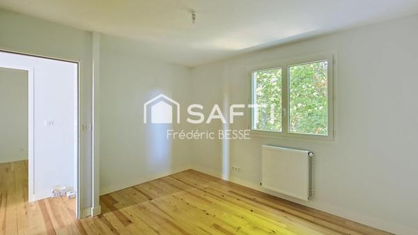 Maison T6 125m² avec garages et jardin de 2200m².