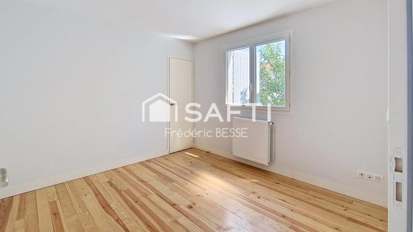 Maison T6 125m² avec garages et jardin de 2200m².