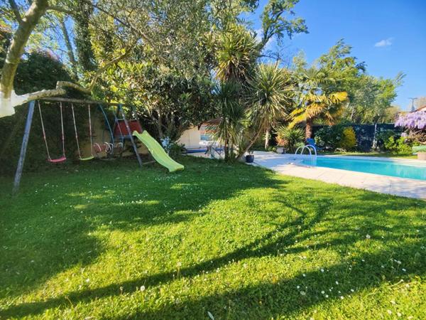 Maison 4 chambres 134m² avec piscine + garage double