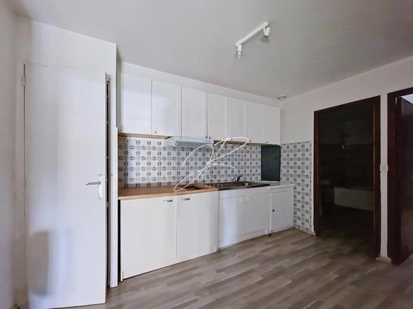 Immeuble 108 m², 2 apartements, garage et remise