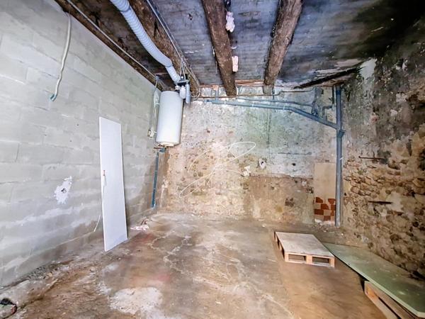 Immeuble 108 m², 2 apartements, garage et remise
