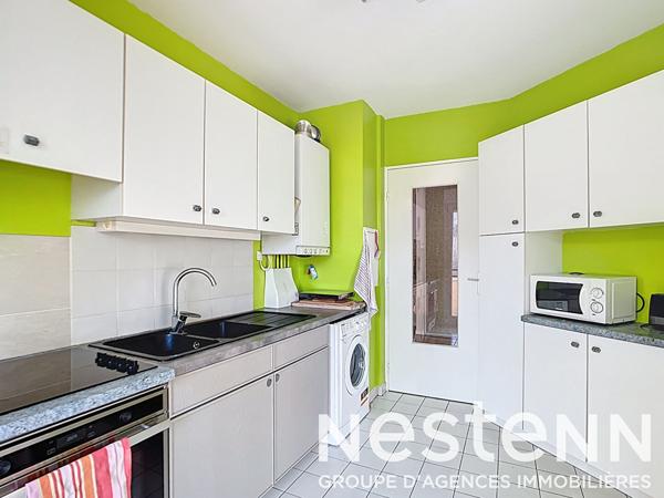 NEUVILLE SUR SAONE - APPARTEMENT T2 62 M² AU CALME VUE ARBOREE AVEC CAVE ET GARAGE PROCHE DES COMMERCES