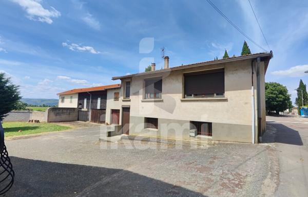 Bien à réhabiliter avec dépendances et terrain constructible