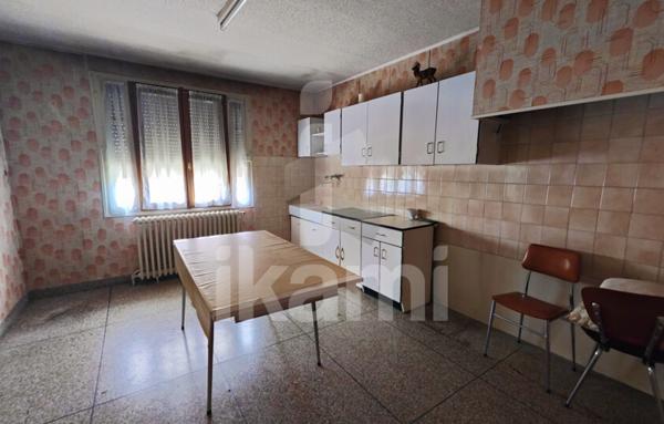 Bien à réhabiliter avec dépendances et terrain constructible