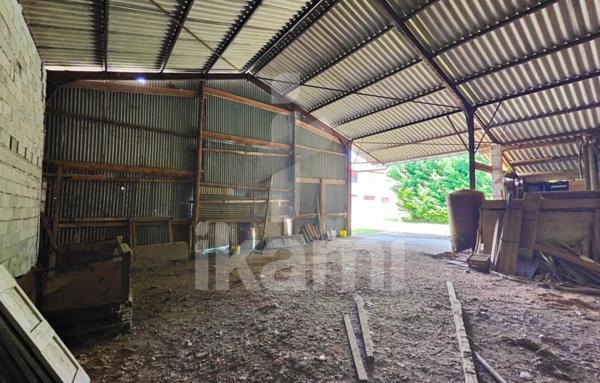 Bien à réhabiliter avec dépendances et terrain constructible