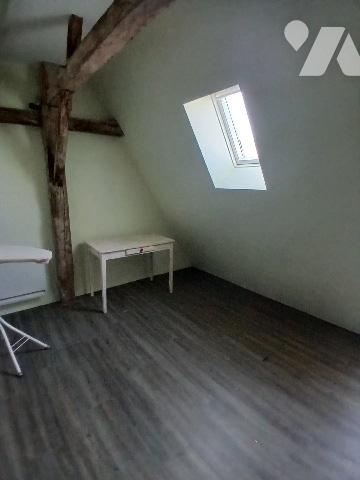 Maison de ville sur trois niveaux avec garage