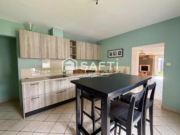 Maison alliant calme et ville