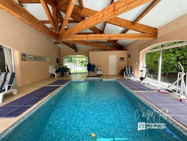 Maison de plain-pied ,170 m², piscine intérieure, parc arboré, garage