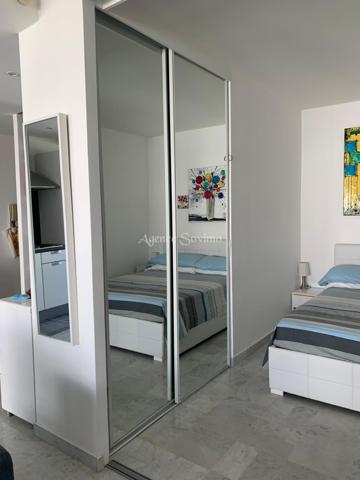 Rare opportunité en bord de mer : appartement avec cave, garage et vue mer