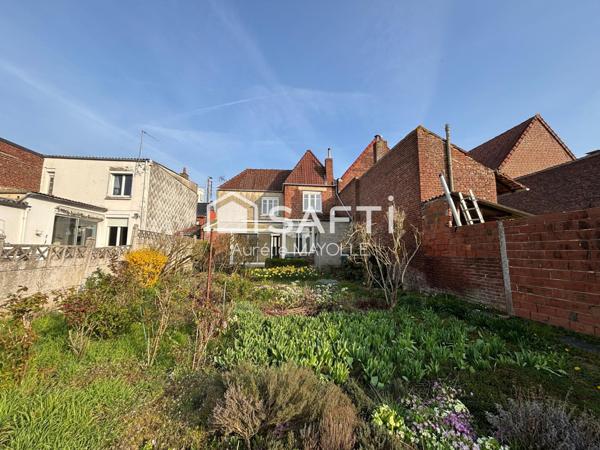 Maison semi individuelle, 4 chambres, jardin, garage non attenant