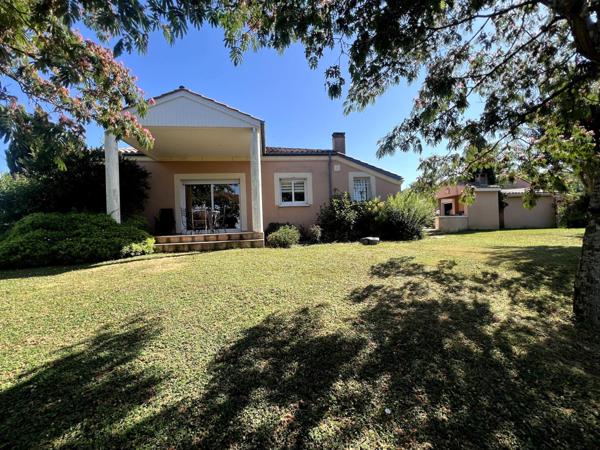 Maison avec double garage, atelier