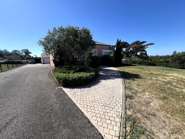 Maison avec double garage, atelier