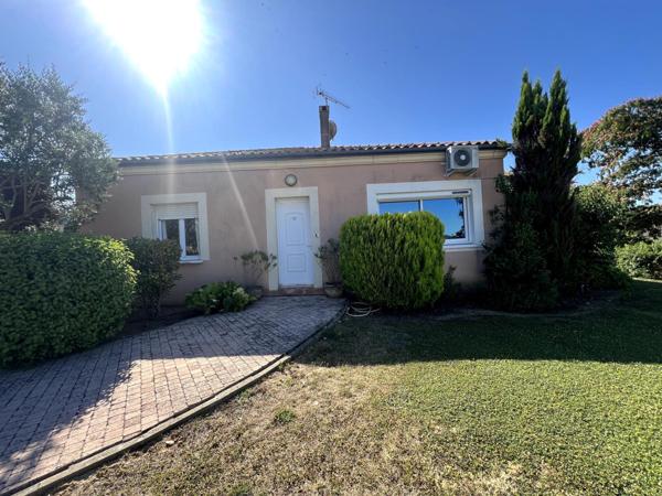 Maison avec double garage, atelier