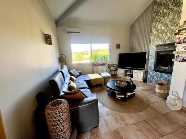 Maison avec double garage, atelier