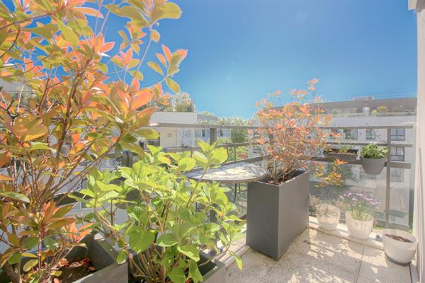 Appartement 5 pièce(s) 88.93 m2 4 chambres + 3 parkings (dont 1 box)