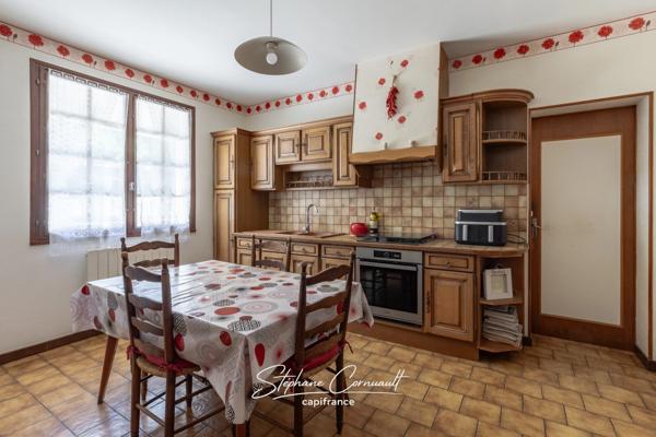 Maison de 115 m² avec grand terrain arboré