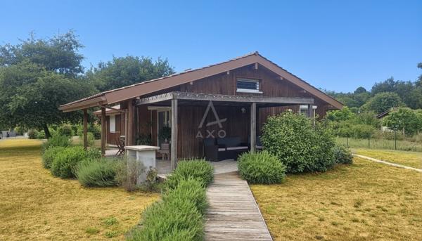 Maison bois de 2007 – 106 m² – 3 chambres – Piscine – Terrain arboré de 2722 m²