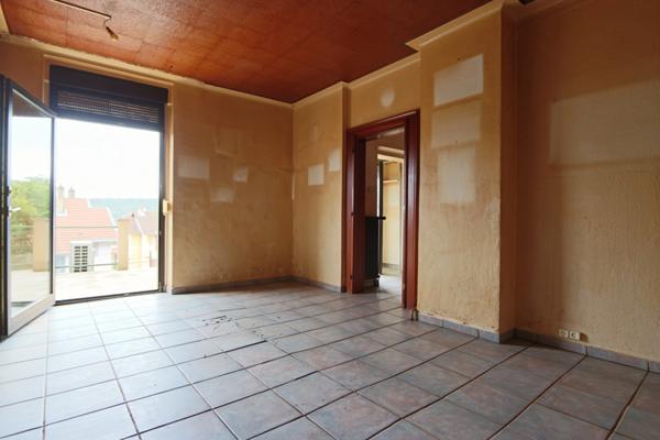 Donnez vie à vos envies : maison à rénover avec garage et terrasse à Nilvange