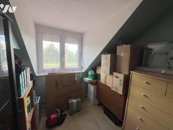 MAISON SEMI-INDIVIDUELLE PAR LE GARAGE