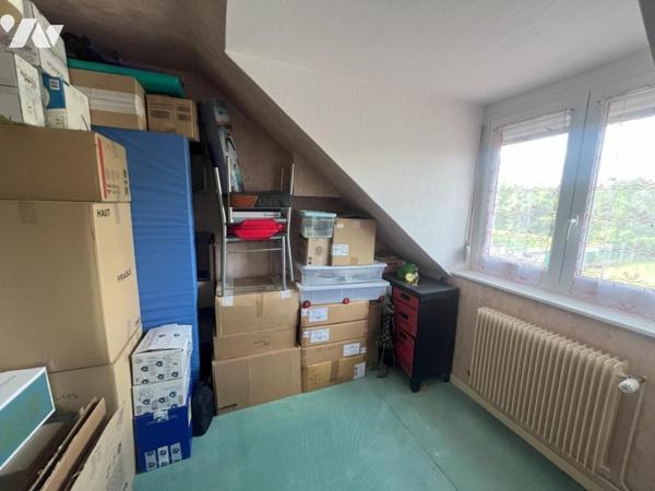 MAISON SEMI-INDIVIDUELLE PAR LE GARAGE