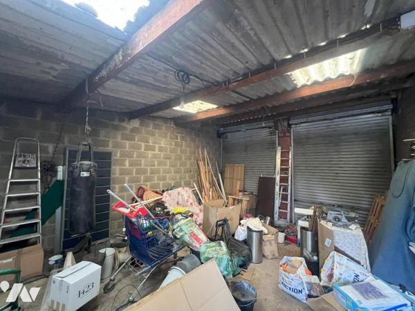 MAISON SEMI-INDIVIDUELLE PAR LE GARAGE