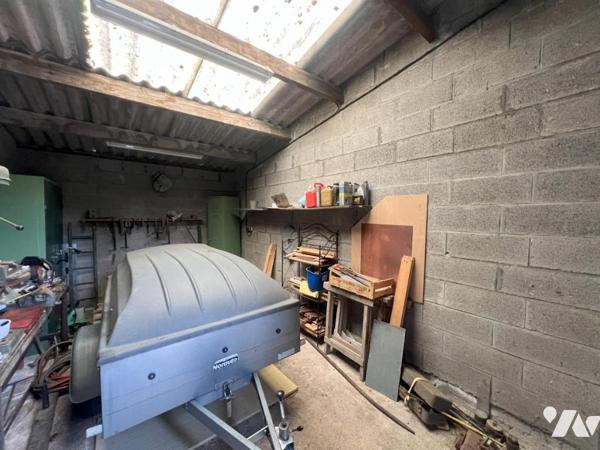 MAISON SEMI-INDIVIDUELLE PAR LE GARAGE