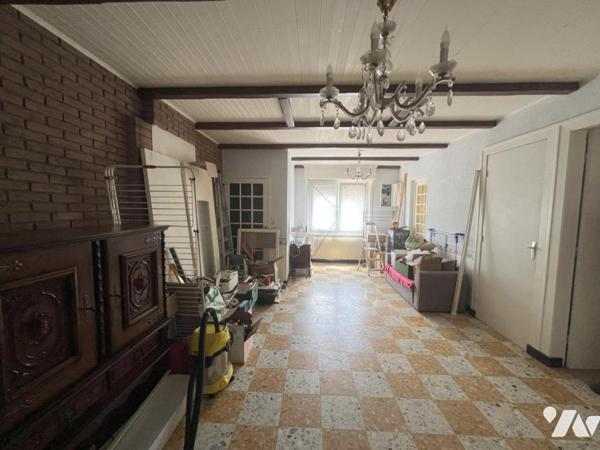 MAISON SEMI-INDIVIDUELLE PAR LE GARAGE