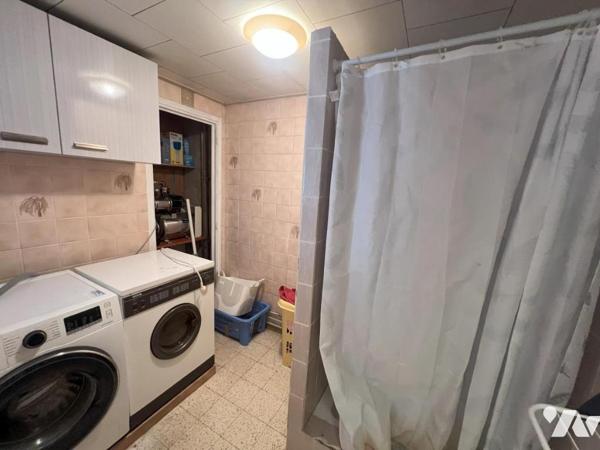 MAISON SEMI-INDIVIDUELLE PAR LE GARAGE