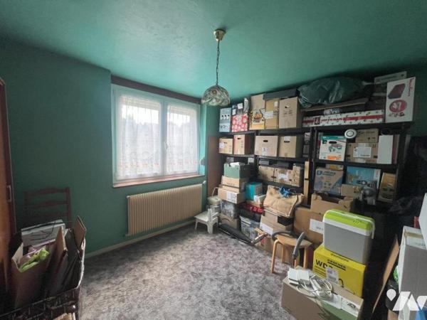 MAISON SEMI-INDIVIDUELLE PAR LE GARAGE