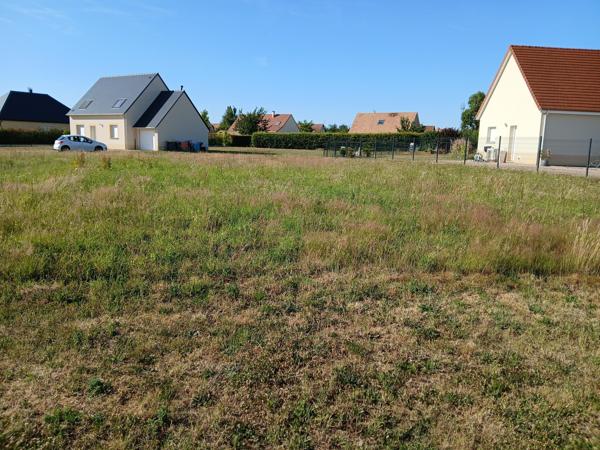 15 mn Evreux, dans bourg avec commerces et écoles ,terrains à bâtir viabilisés