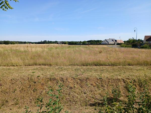15 mn Evreux, dans bourg avec commerces et écoles ,terrains à bâtir viabilisés