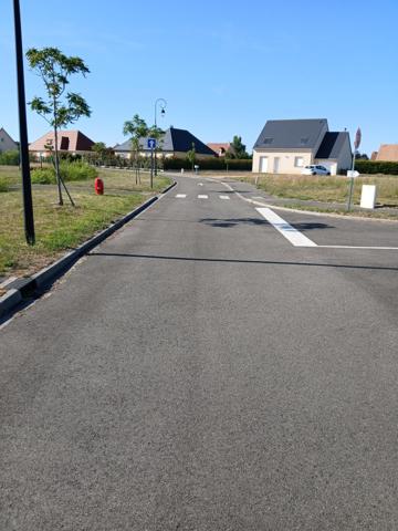 15 mn Evreux, dans bourg avec commerces et écoles ,terrains à bâtir viabilisés