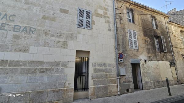 Immeuble de rapport avec local commercial et un logement type du
