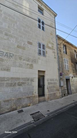 Immeuble de rapport avec local commercial et un logement type du
