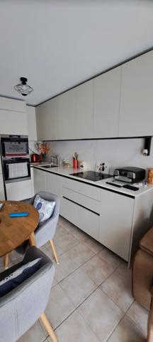 Logement avec terrasse couverte