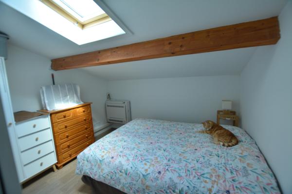 Logement avec terrasse couverte