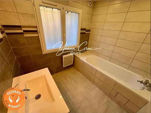 Appartement type 4 120 m2 entièrement rénové avec jardin et parking