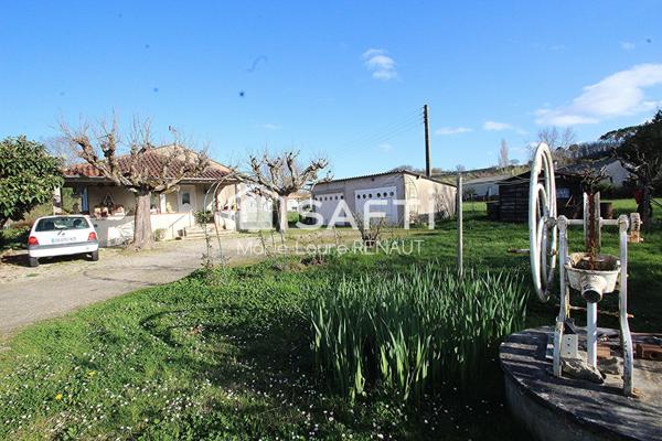 Maison de plain-pied - Grand terrain - 2 garages et dépendances - Terrain constructible