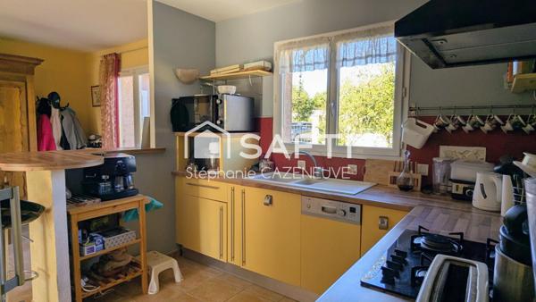 Plain-pied avec garage, terrain clos arboré - Proche rocade