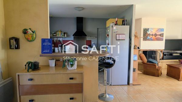 Plain-pied avec garage, terrain clos arboré - Proche rocade