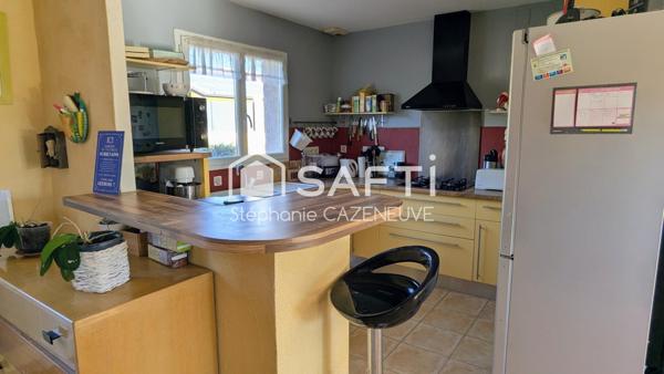 Plain-pied avec garage, terrain clos arboré - Proche rocade