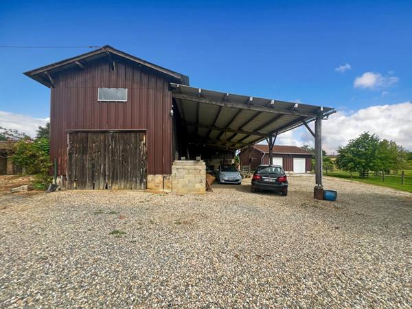 Propriété avec 2 maisons - séchoir réhabilitable et double garage