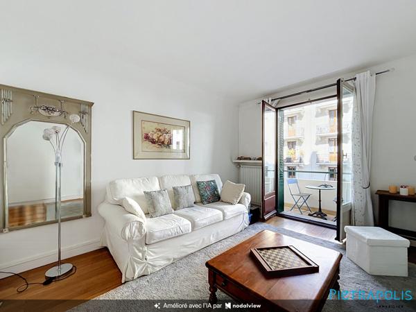Appartement de type T2 en centre ville, avec balcon, à proximité des commerces et transports