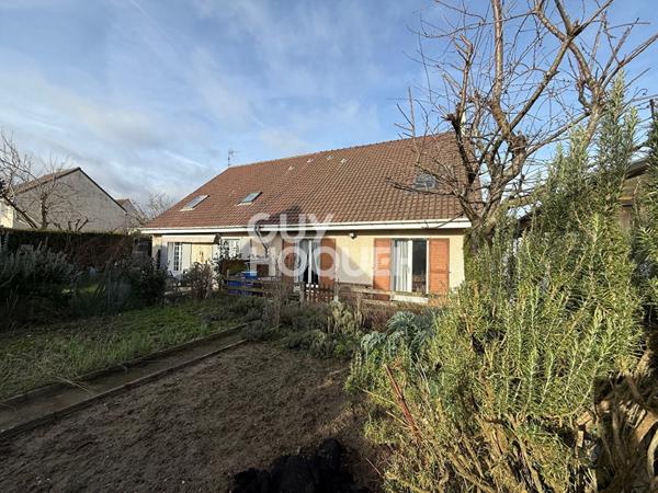 Maison mitoyenne avec jardin et sous-sol complet IFS