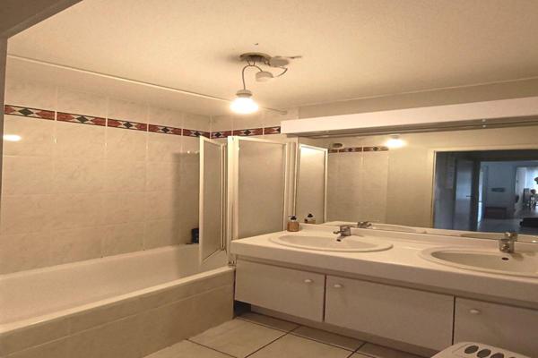 Appartement 4 pièces avec terrasse, parking et garage