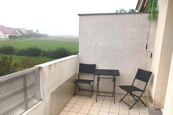 Appartement 4 pièces avec terrasse, parking et garage