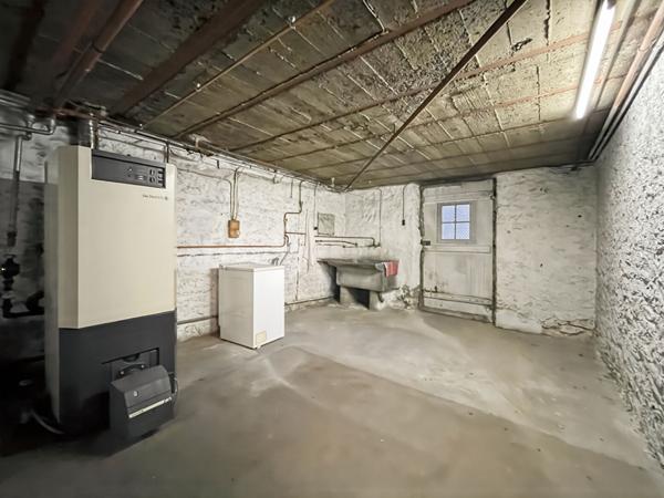 MAISON EN STYLE MEULIÈRE AVEC SOUS-SOL ET GARAGE