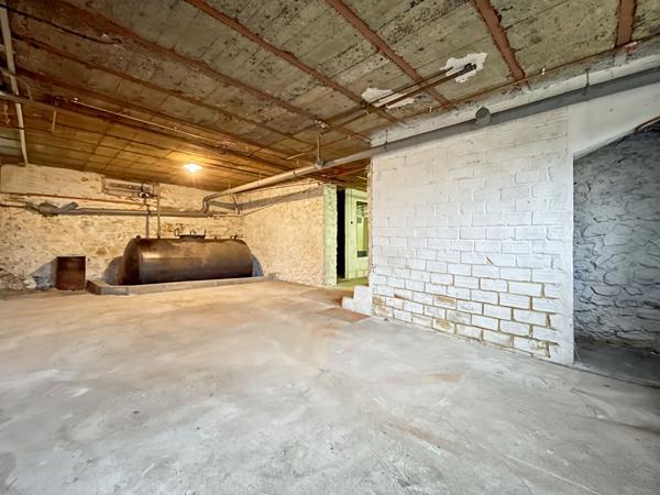 MAISON EN STYLE MEULIÈRE AVEC SOUS-SOL ET GARAGE