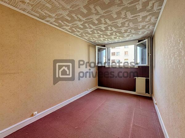 APPARTEMENT F4 TRAVERSANT AVEC BALCON, BOX ET CAVE