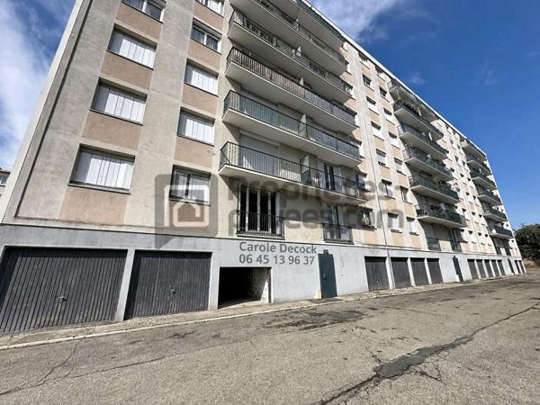 APPARTEMENT F4 TRAVERSANT AVEC BALCON, BOX ET CAVE